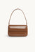The Baguette Patent Bag - Chocolate/Light Gold